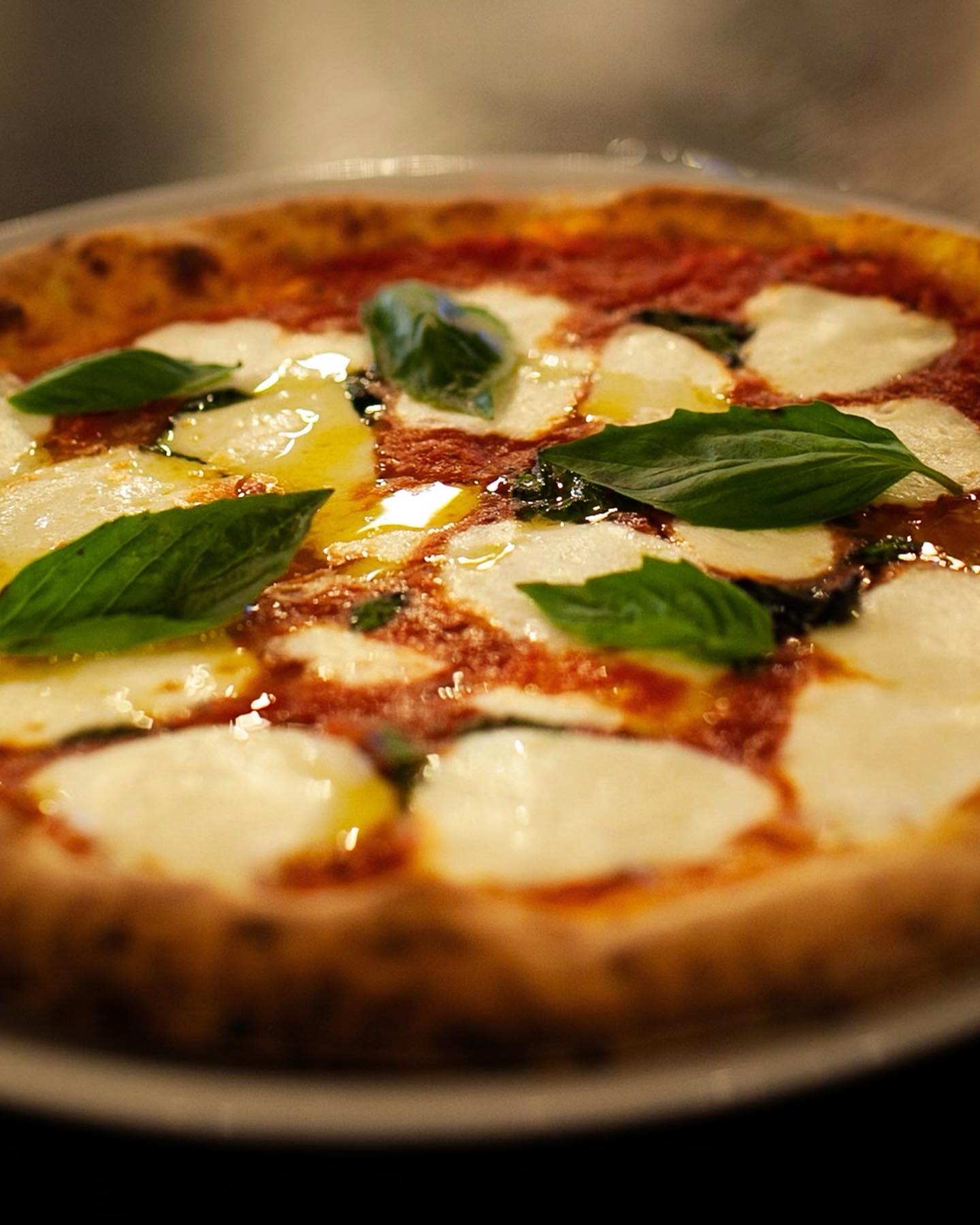 Wood-fired Margherita pizza